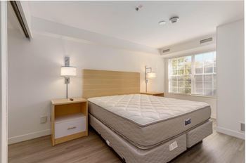 Comfortable bedroom with large window